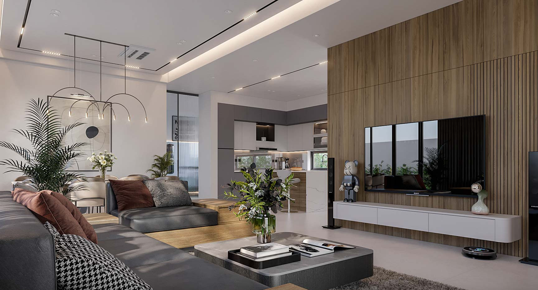 Những bộ sofa bằng gỗ với nệm ghi xám nổi bật được đặt tại vị trí trung tâm của phòng khách
