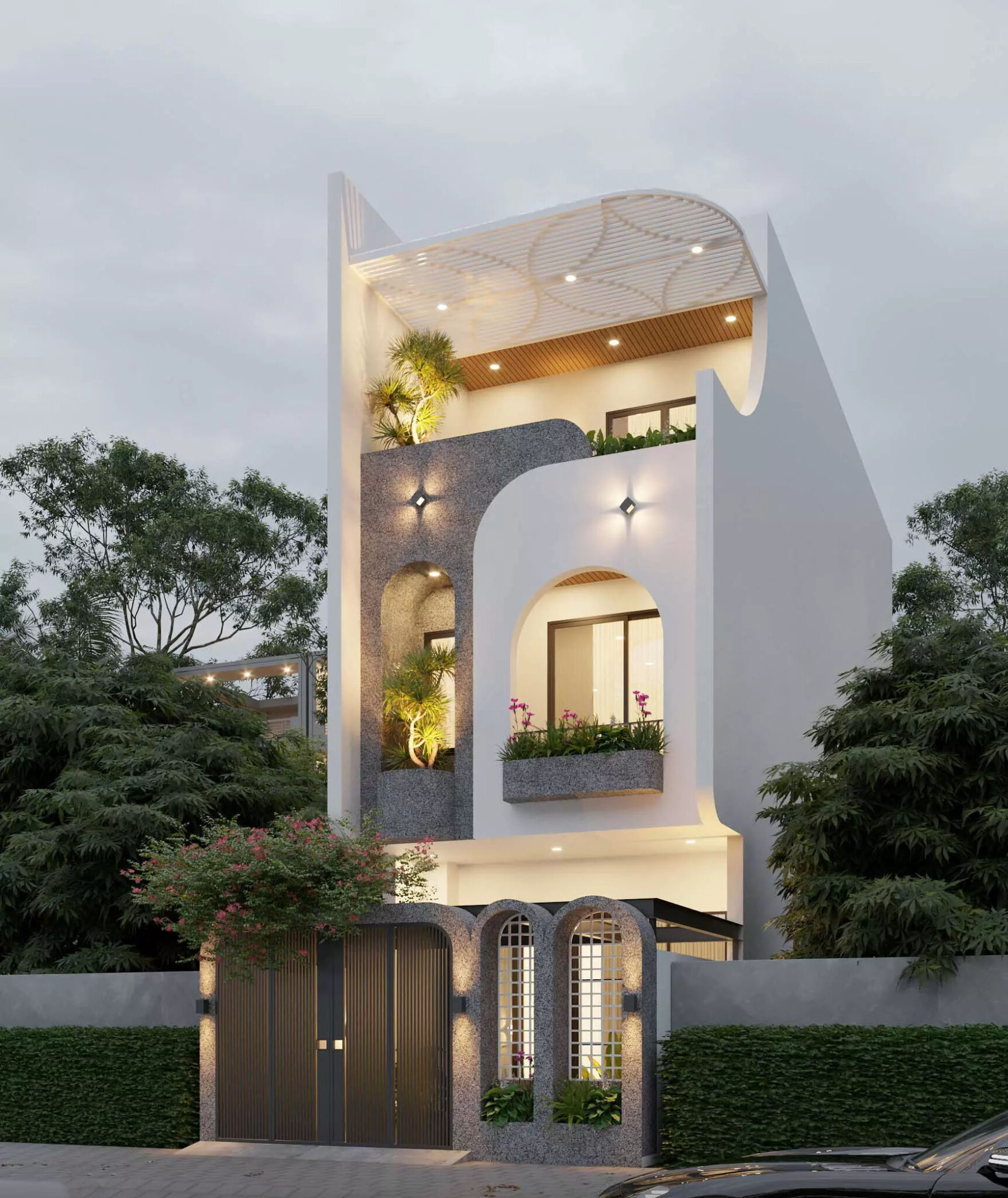 Mặt tiền My's house ấn tượng với các mảng tường bo cong màu trắng – xám được sắp xếp khéo léo