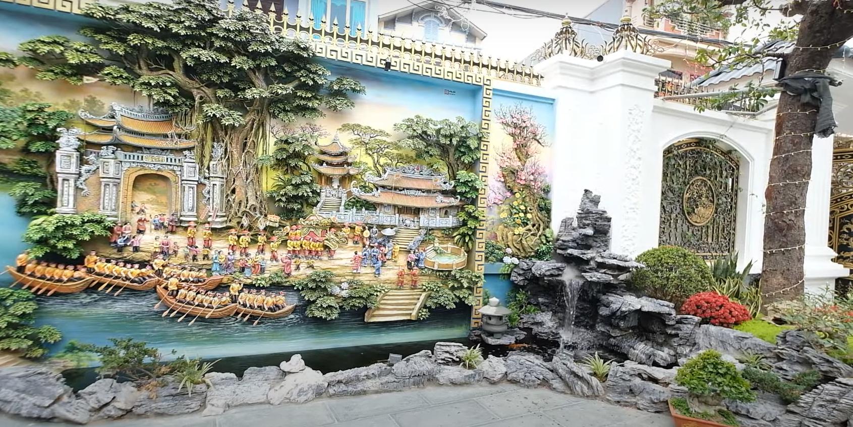 Ngôi nhà gỗ đẹp đơn giản còn được bố trí một hồ cá koi nhỏ